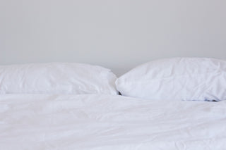 Is Sleeping With Two Pillows Bad For Your Neck?